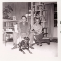 Ross L. and LuLu Talbot in their family room with their beloved dog, Mark